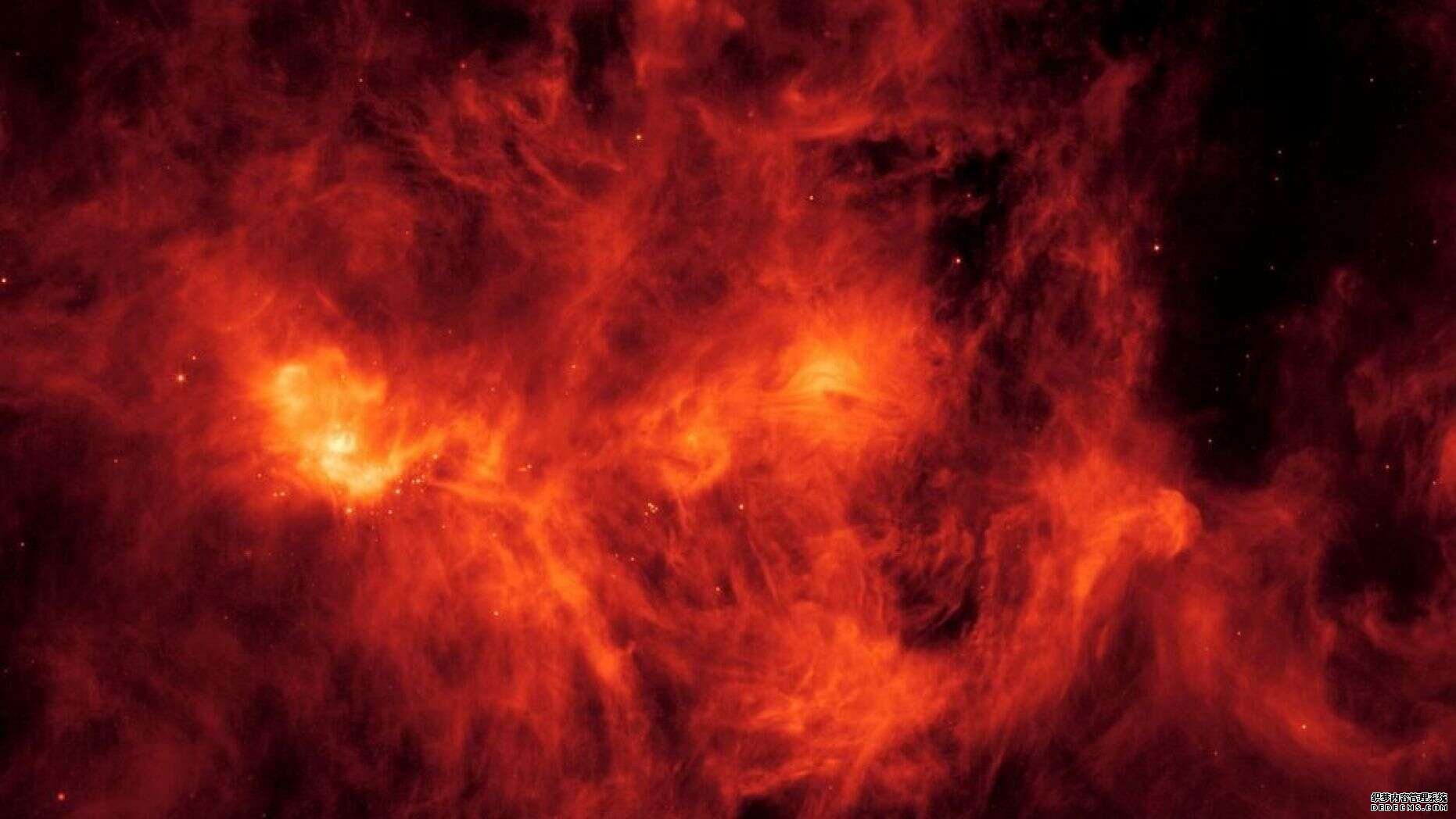 杏3沐鸣平台,美国宇航局的斯皮策望远镜捕捉到了太空中大量燃烧的云